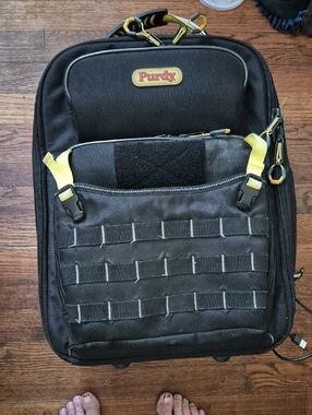 Pur Durable Black Backpack with Yellow Accents